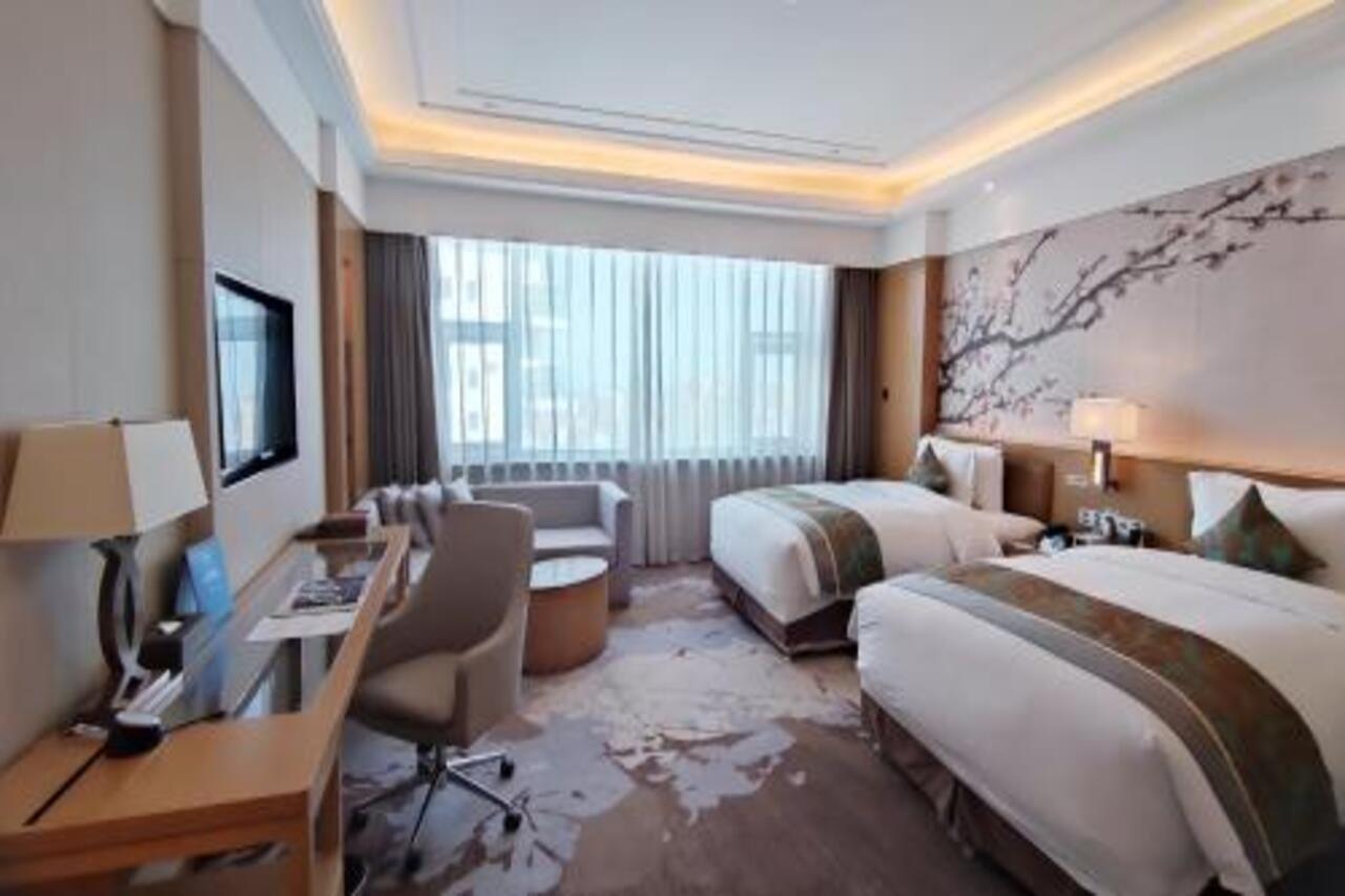 Howard Johnson Xiangyu Plaza Linyi Лини Екстериор снимка